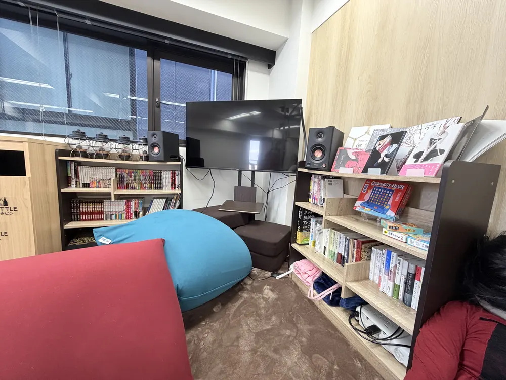 Shelves of manga and books in the Luna office